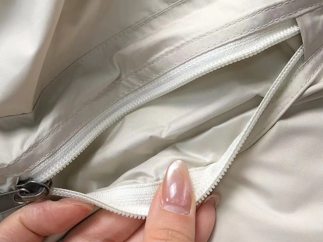 The North Face Cream White Puffer Jacket